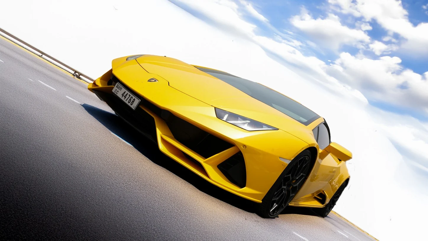2023 Lamborghini Huracan Evo Spyder Yellow luxury car rental in Dubai